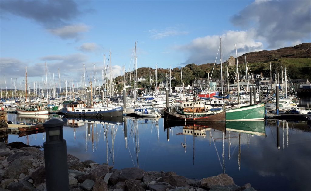 Dozens of sailing boats moored outside the Clyde Cruising Club