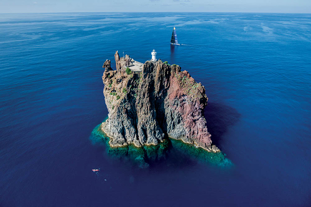 Sailing photos: island of Strombolicchio in the Rolex Middle Sea Race. Photo by Kurt Arrigo/Rolex