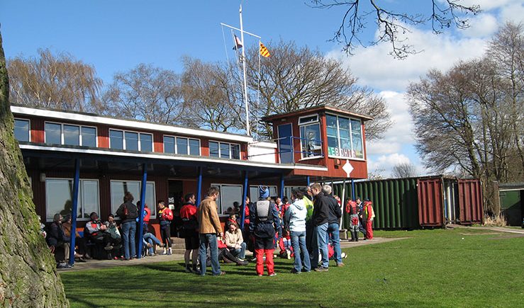 Sailors prepare to go out on the water in the gardens of Budworth Sailing Club