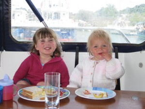 Children eating on a boat