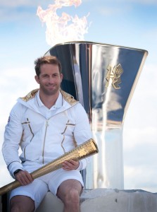 Ben Ainslie lighting the flame in Weymouth and Portland - photo Onedition