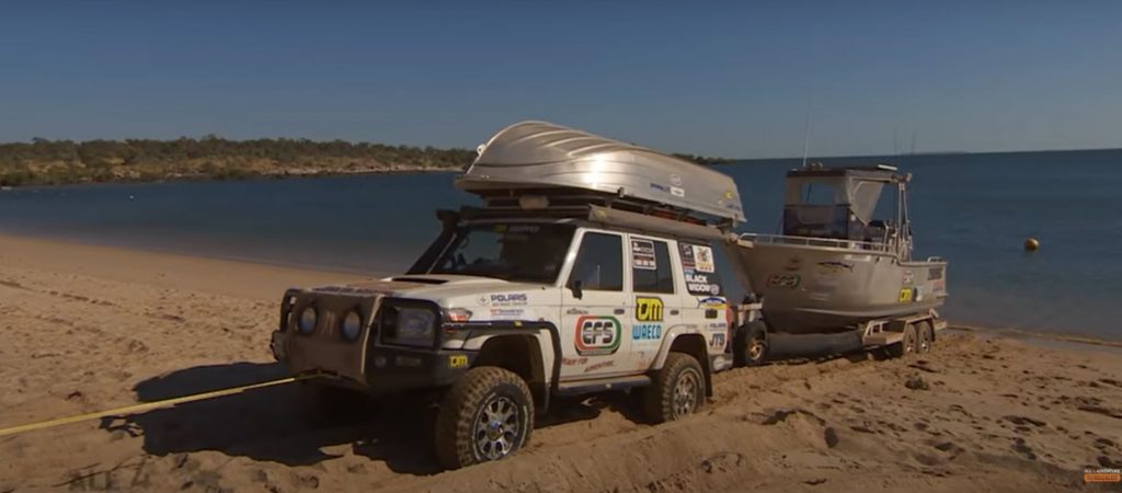 All 4 Adventure: How to tow a boat across a sandy beach.