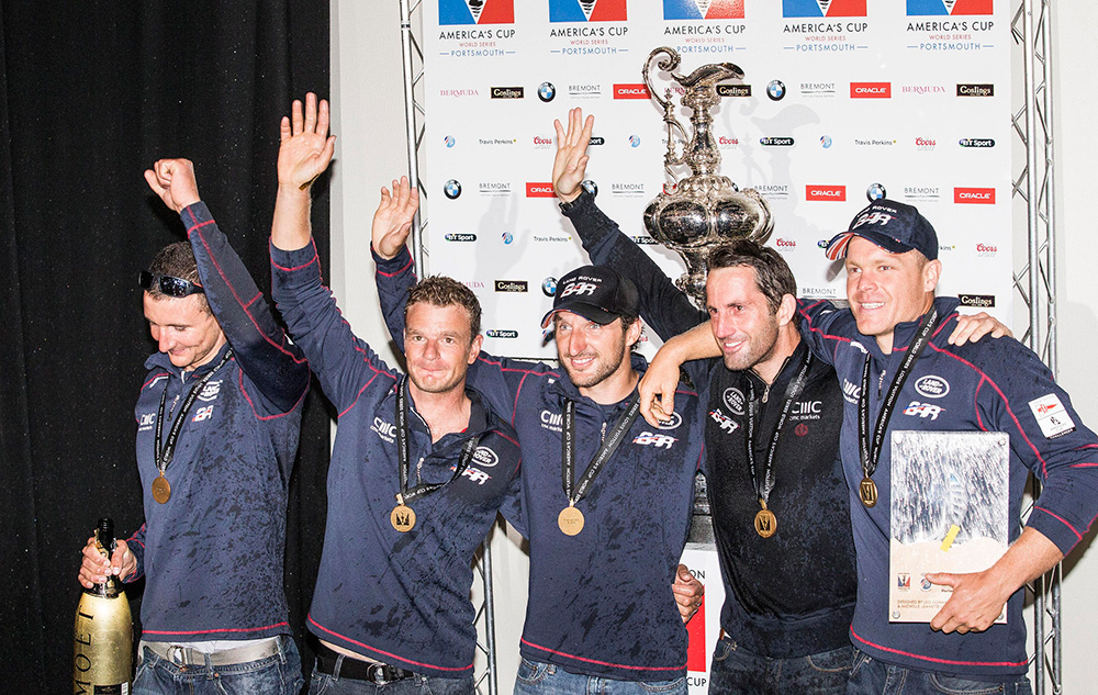Ben Ainslie and his team celebrate winning the America's Cup World Series event in Portsmouth.