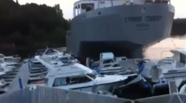 Container ship destroys a marina