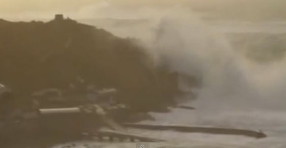 Massive wave crashes over Cornish cliff